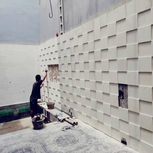 Cat pelapis batu alam